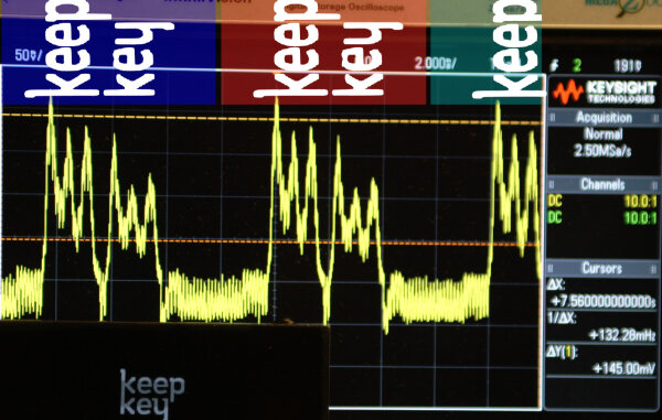 KeepKey device and oscilloscope trace with corresponding OLED screen overlay