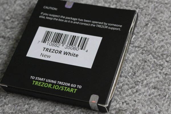 Trezor One package after attack, without re-gluing